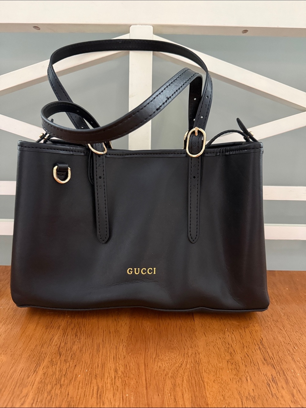 Black handle crossbody bag